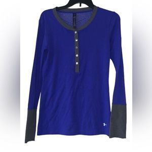 Under Armour. Blue Long Sleeve Shirt. Sized medium. Used Great Condition.